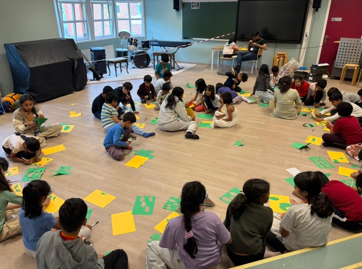 Children taking part in a creative group activity