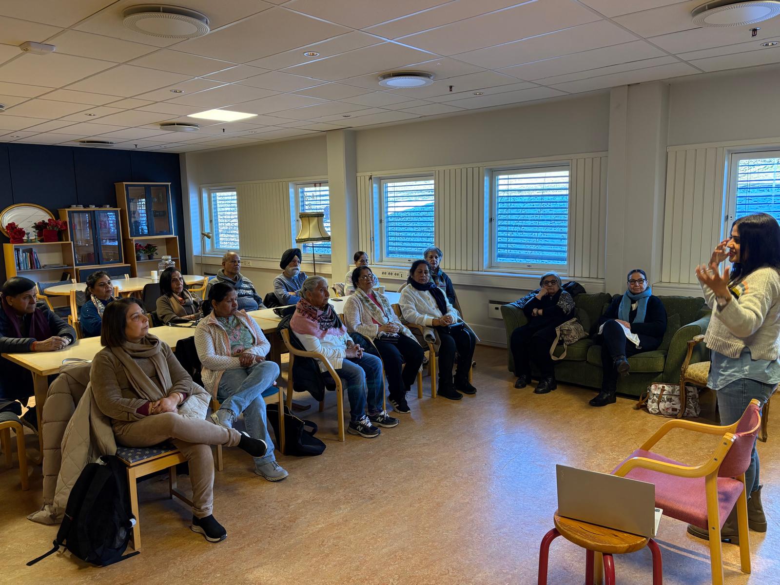 Older adults taking part in a community mental wellbeing session