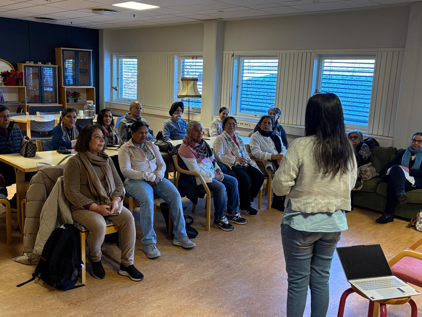 Older adults taking part in a community mental wellbeing session